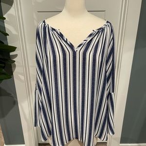 J Lo flirty blouse with peek a boo sleeves. XXL